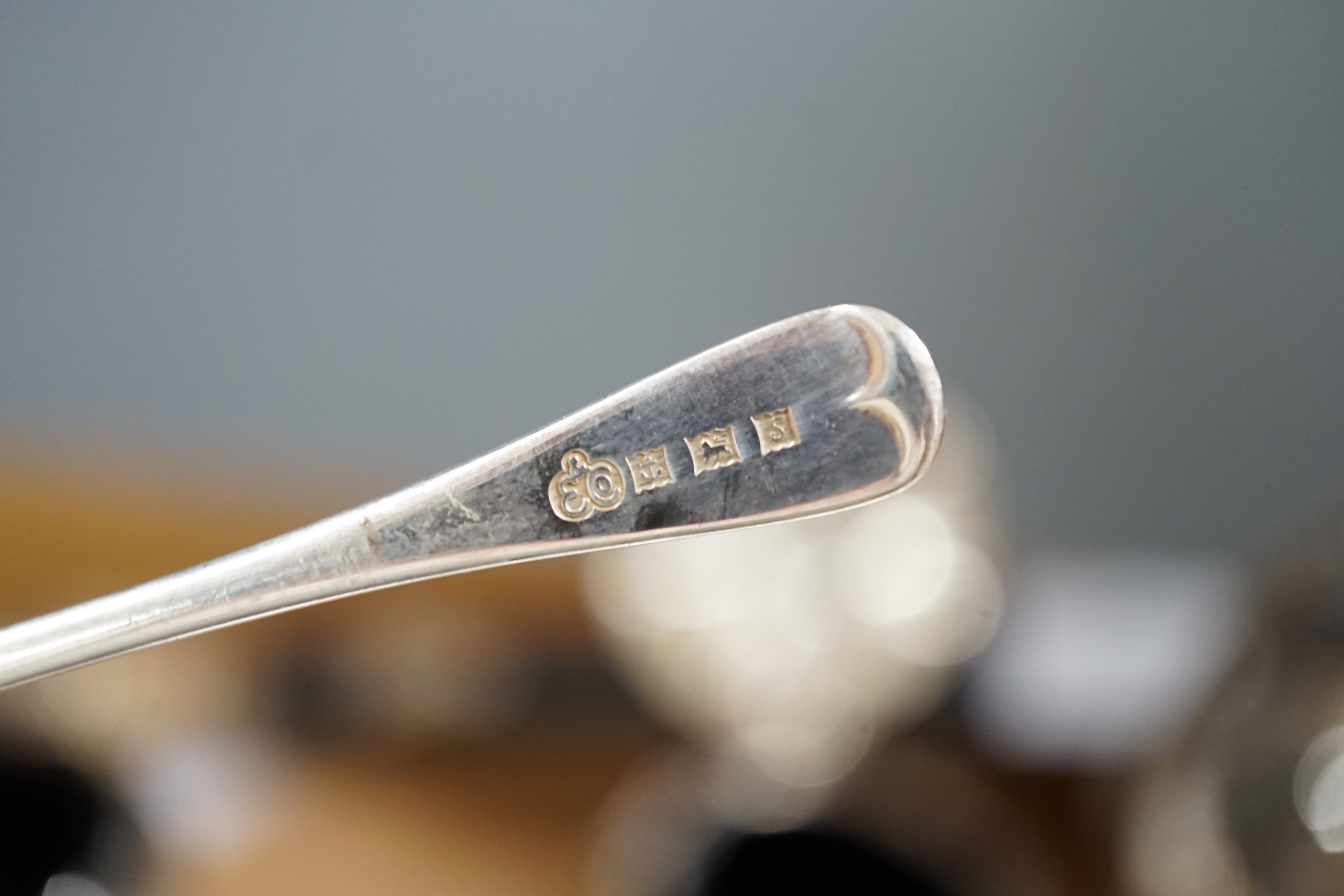 A white metal handled tortoiseshell paper knife and sundry small silver items, including an Edwardian pot pourri basket and two silver condiments by Elkington & Co.